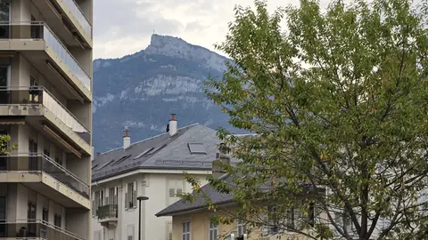 A limestone ridge standing over the rooftops.