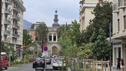 Back towards the bags, with a mountain at the end of the street.