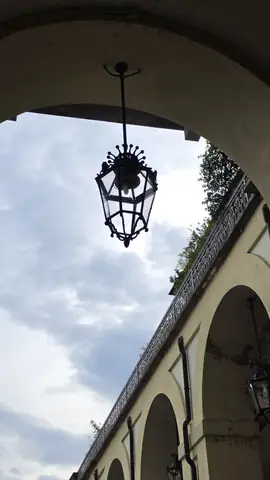 A lantern under the arcades.