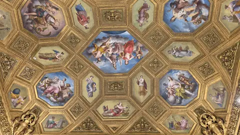 A ballroom ceiling, painted into next week.
