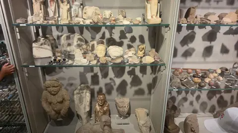 Funerary figurines by the hundred — a workforce for the afterlife.