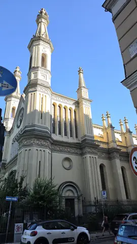 A church front, and the last of the sun on it.