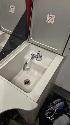 Six in the morning, somewhere south, in a train washroom.