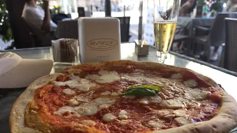 Pizza, in the city that invented it. It is not a close-run thing.