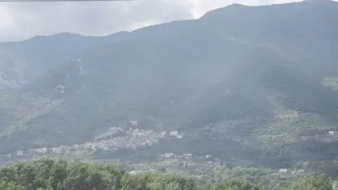 Hills now, and the light going hard and white.
