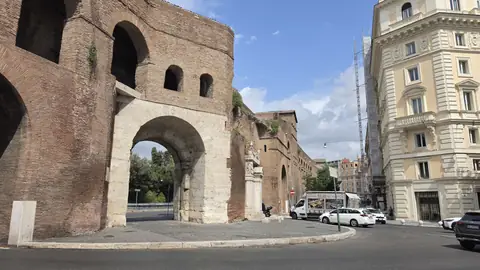 Through the old wall, which is still just standing there in the traffic.