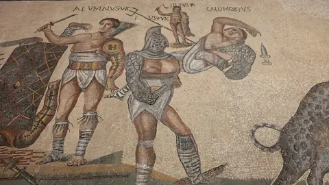 A gladiator mosaic, laid out across the floor.
