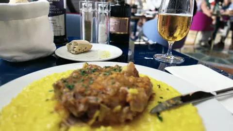 Shin of veal on a bed of saffron Risotto rice.
