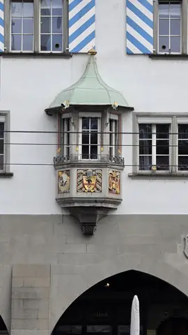 An oriel window, painted and gilded.