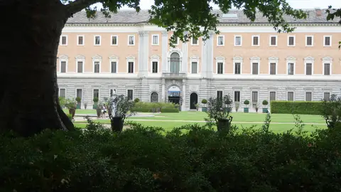 The palace front across the lawn.
