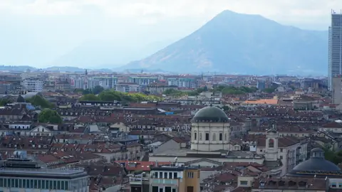 Turin from above, with the mountains closing the view.