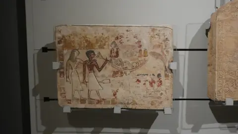 A painted relief, colours still in it.