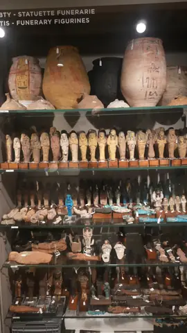 Funerary figurines, rank on rank.